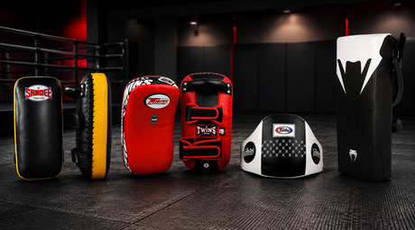 Muay Thai Pads UK: The Complete Guide to Thai Pads, Curved Pads, Belly Pads & Kick Shields