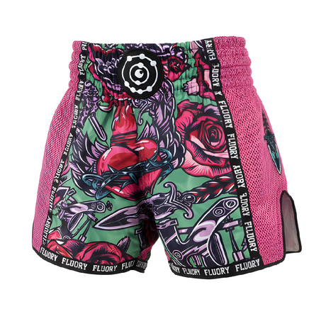 Colorful athletic shorts with floral and abstract design on a white background