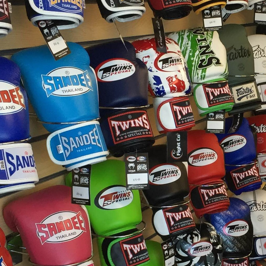 Store Image of Thai Boxing Gloves from brands Twins, Sandee and Fairtex on display