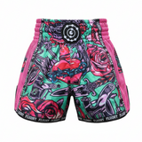 Colorful shorts with a floral and abstract design on a white background